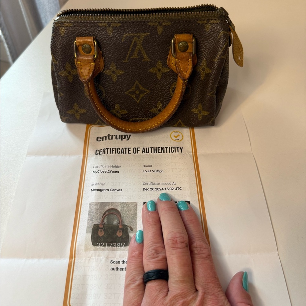 Louis Vuitton Monogram Mini speedy in Brown and Gold
